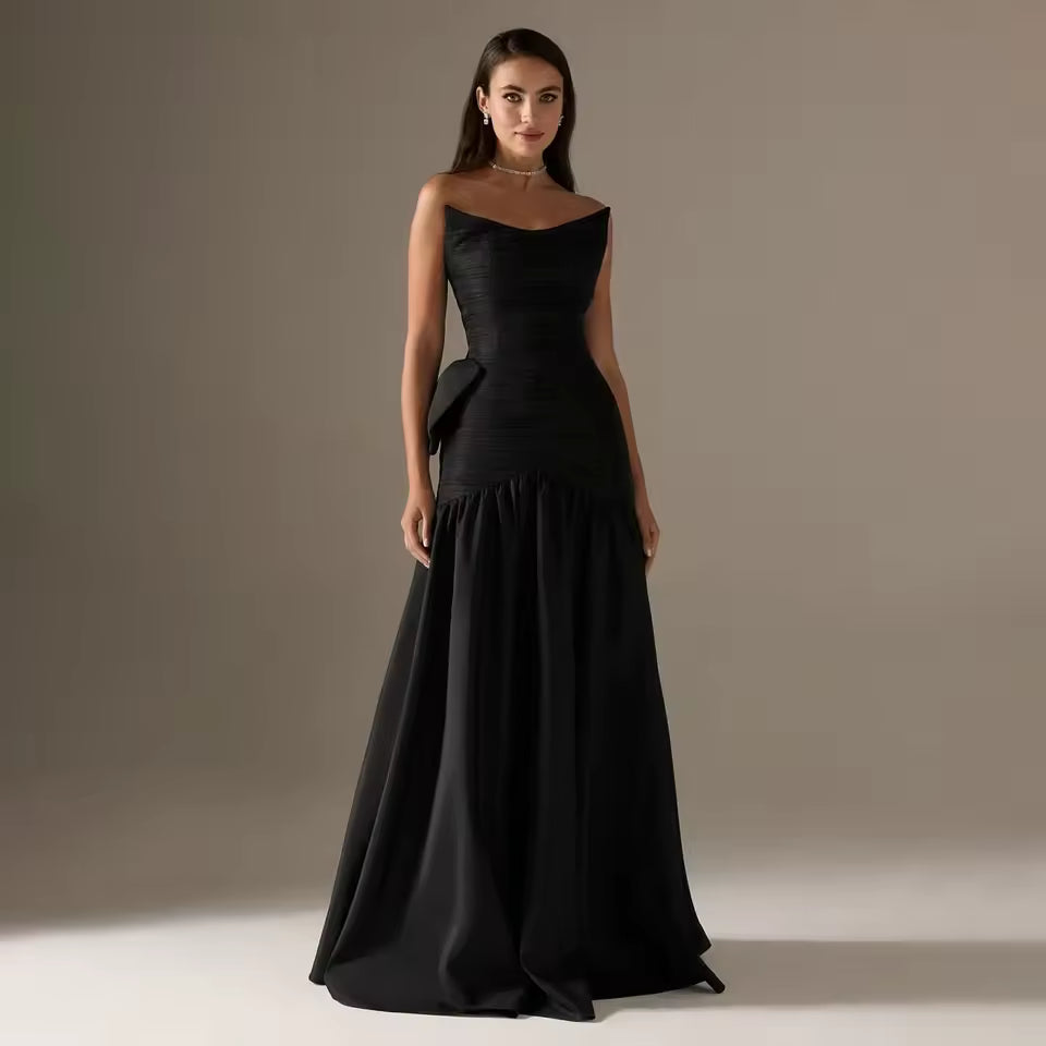 Woman wearing The Old Money Collection Couture Candelaria Gown
