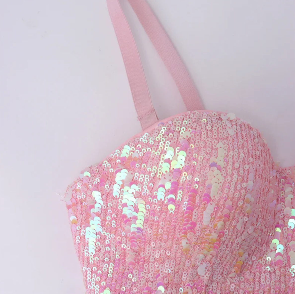 Bobi handmade pink corset bustier featuring iridescent sequin embellishments and structured straps.