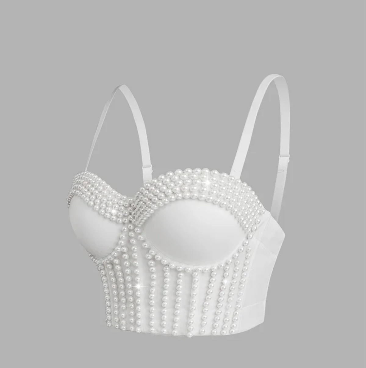 White handmade corset camisole featuring intricate pearl embellishments and adjustable straps for a luxurious look.