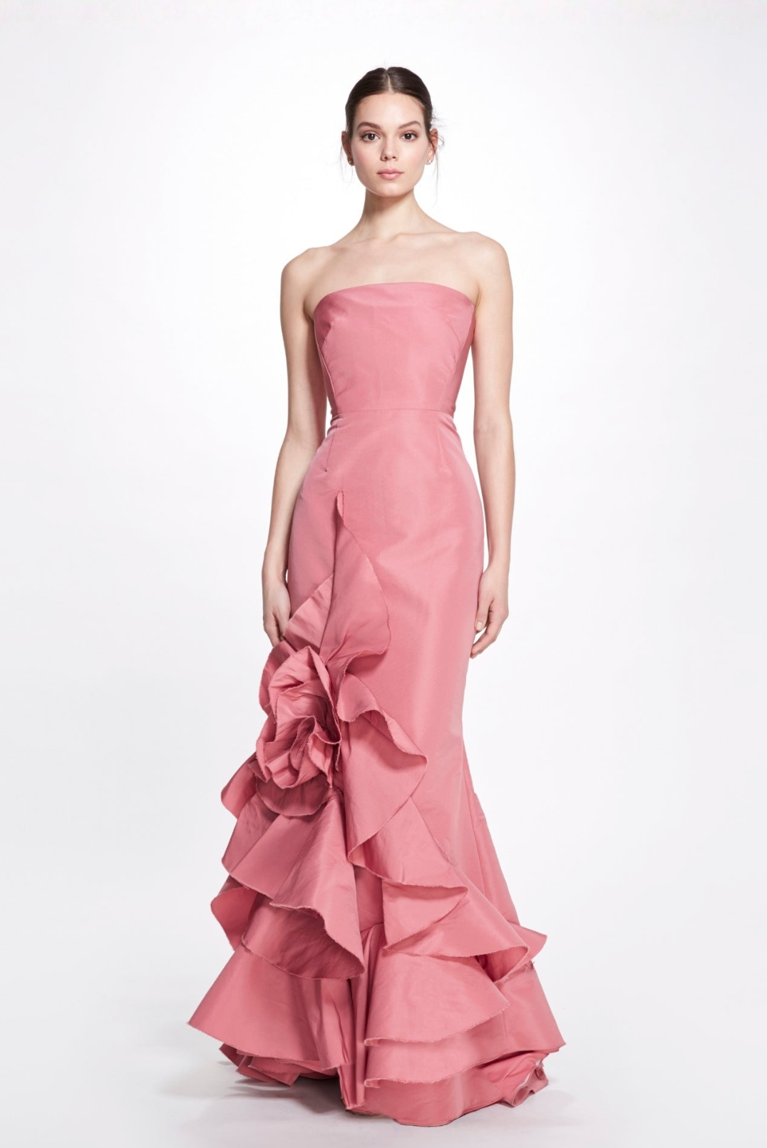 Rosetta gown in pink faille featuring a strapless fitted bodice and a cascading 3D floral ruffle detail.