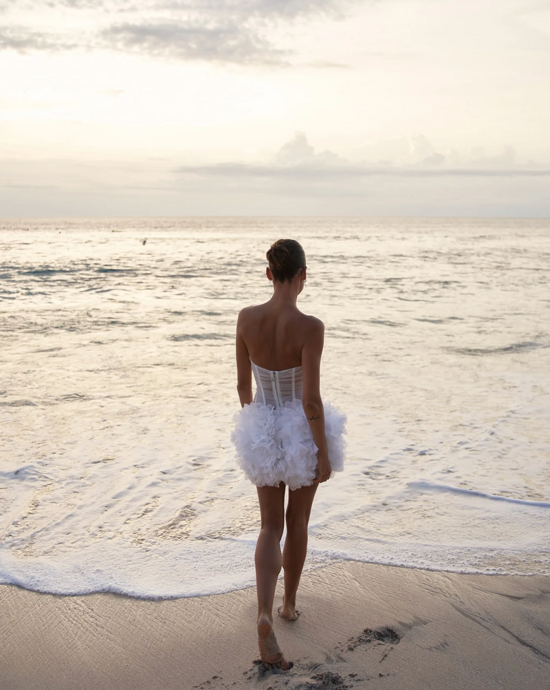 Woman wearing the Old Money Collection Couture Hilo Party Dress