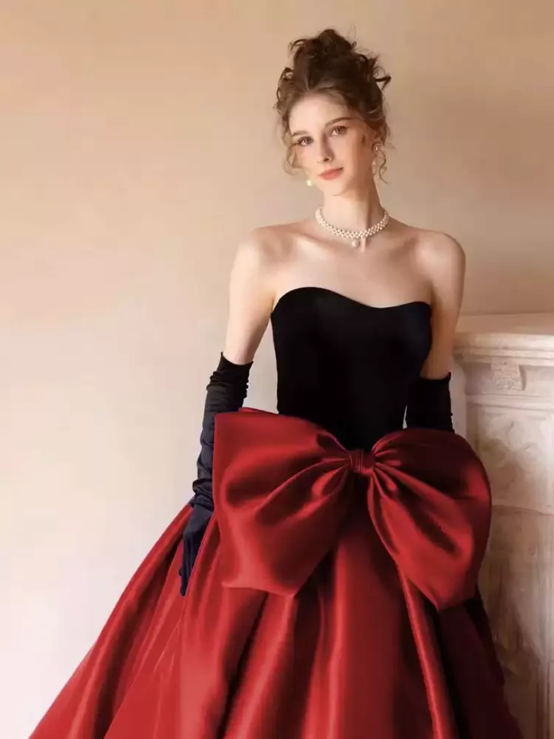 Woman wearing the Old Money Collection Couture Lowndess Gown