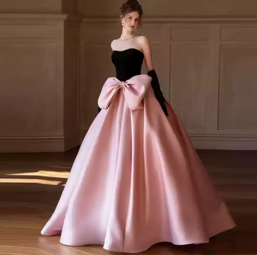 Woman wearing the Old Money Collection Couture Lowndess Gown