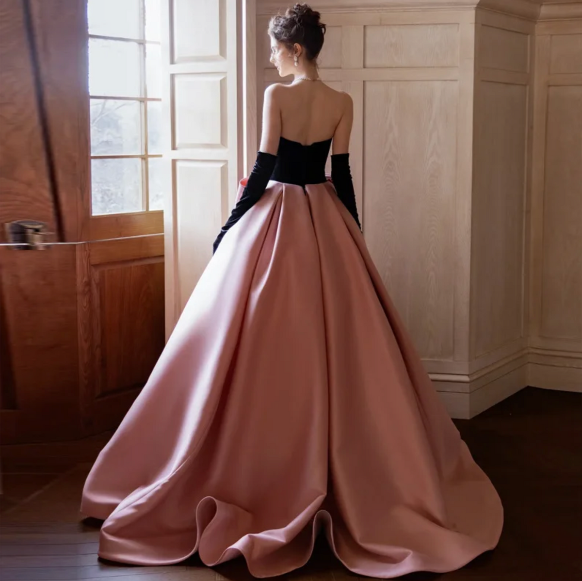 Woman wearing the Old Money Collection Couture Lowndess Gown
