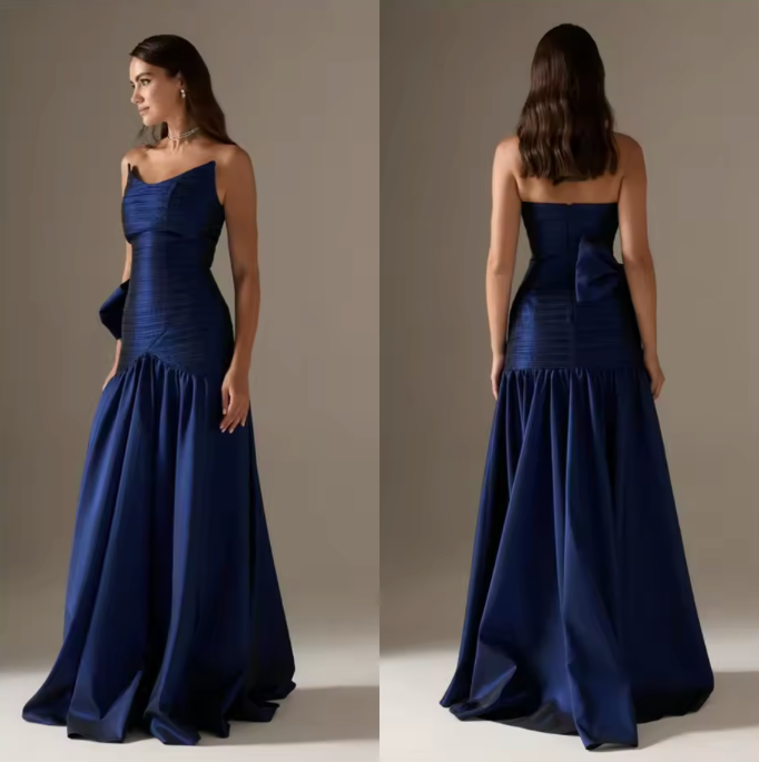 Woman wearing The Old Money Collection Couture Candelaria Gown