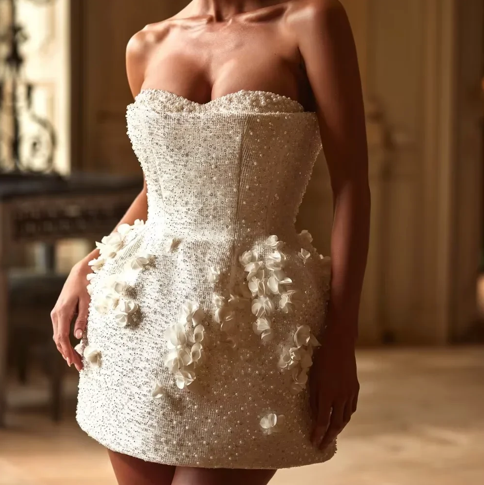 Woman wearing the Old Money Collection Couture Weidlake Mini Gown