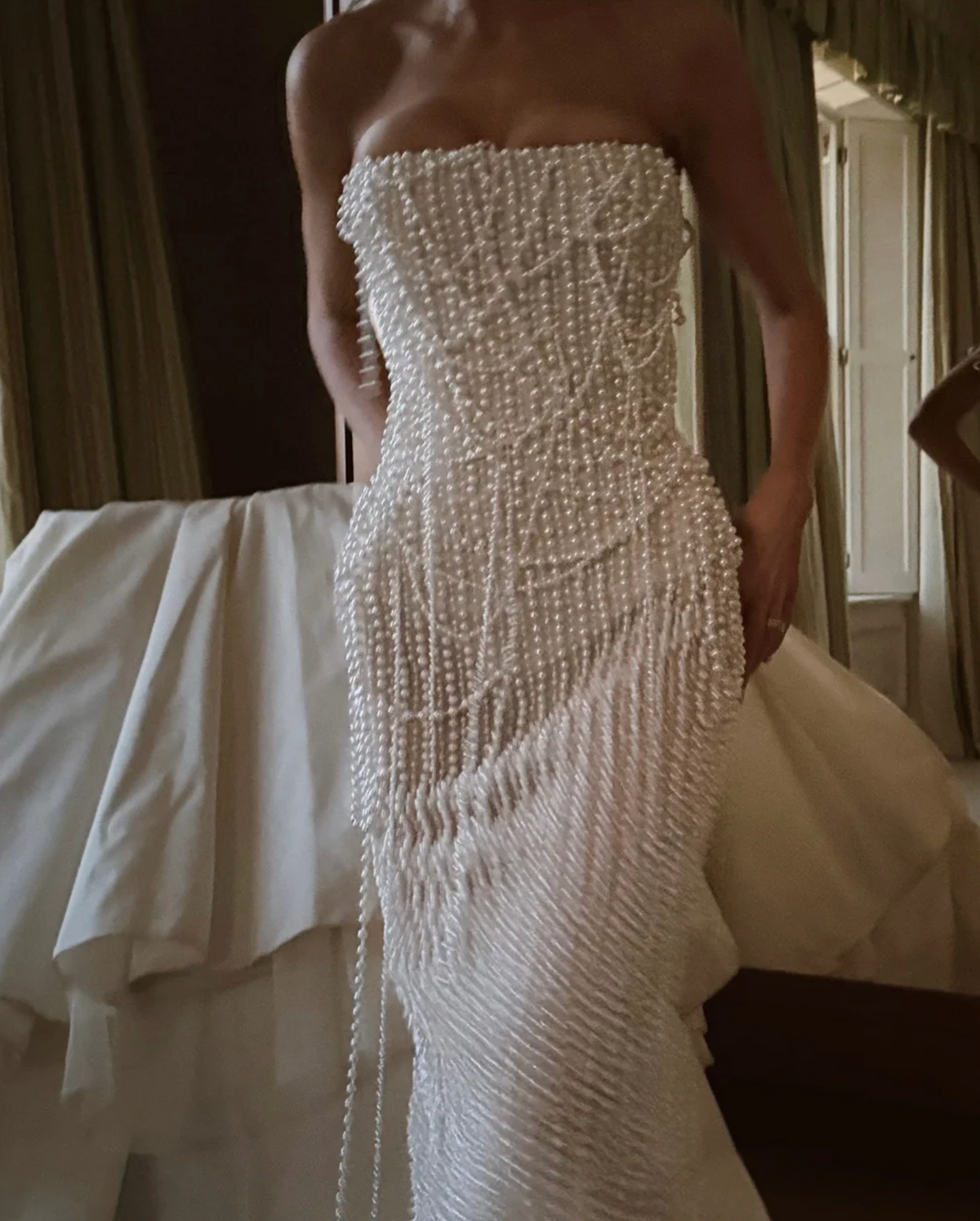 Woman wearing the Old Money Collection The Weaverly Party Dress