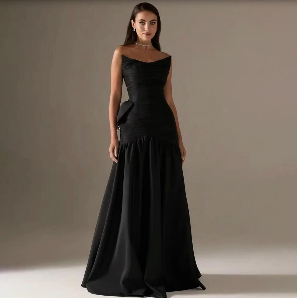 Woman wearing The Old Money Collection Couture Candelaria Gown
