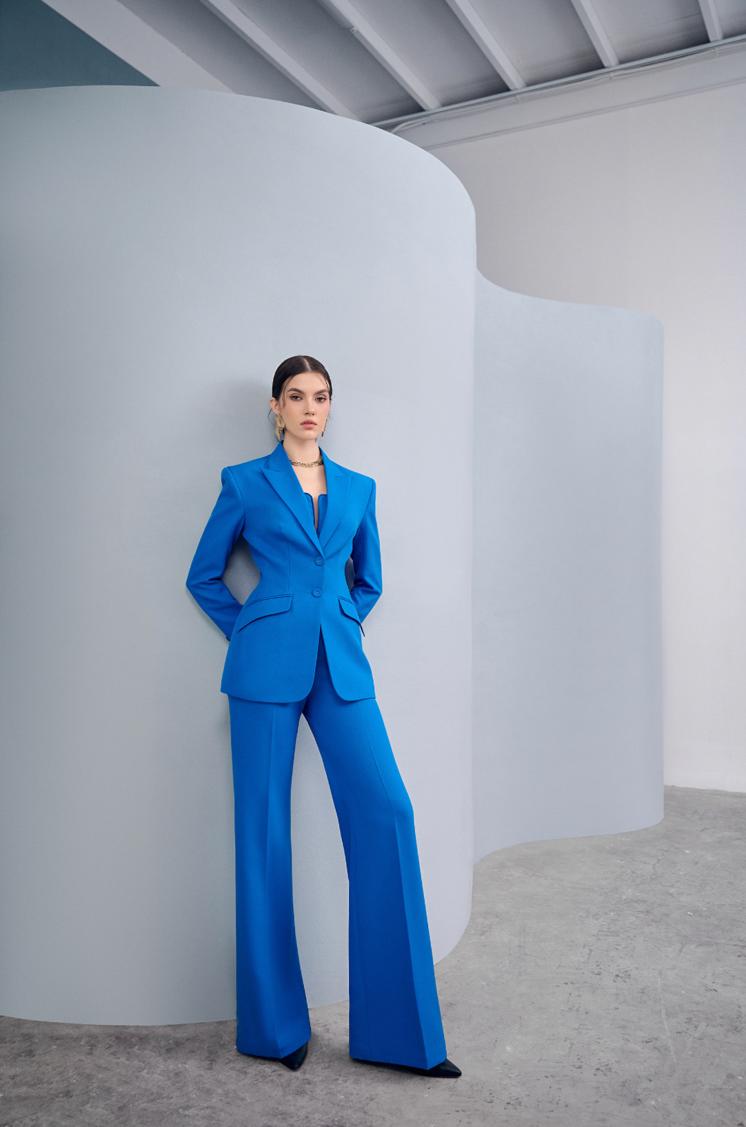 Woman wearing the Old Money Collection Couture Bowery Business Suit