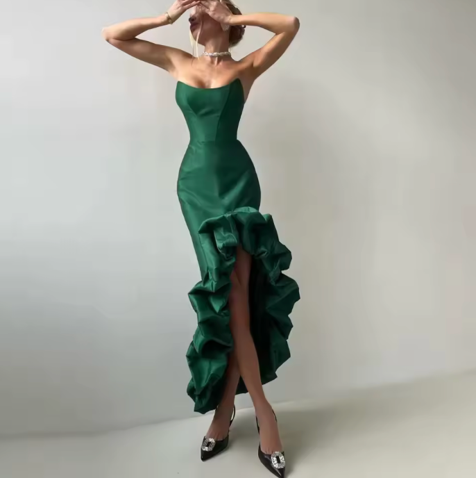Woman wearing the Old Money Collection Couture green Herne Bay Cocktail Dress