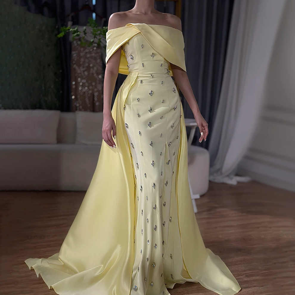 Woman Wearing The Old Money Collection Couture Mulholland Gown