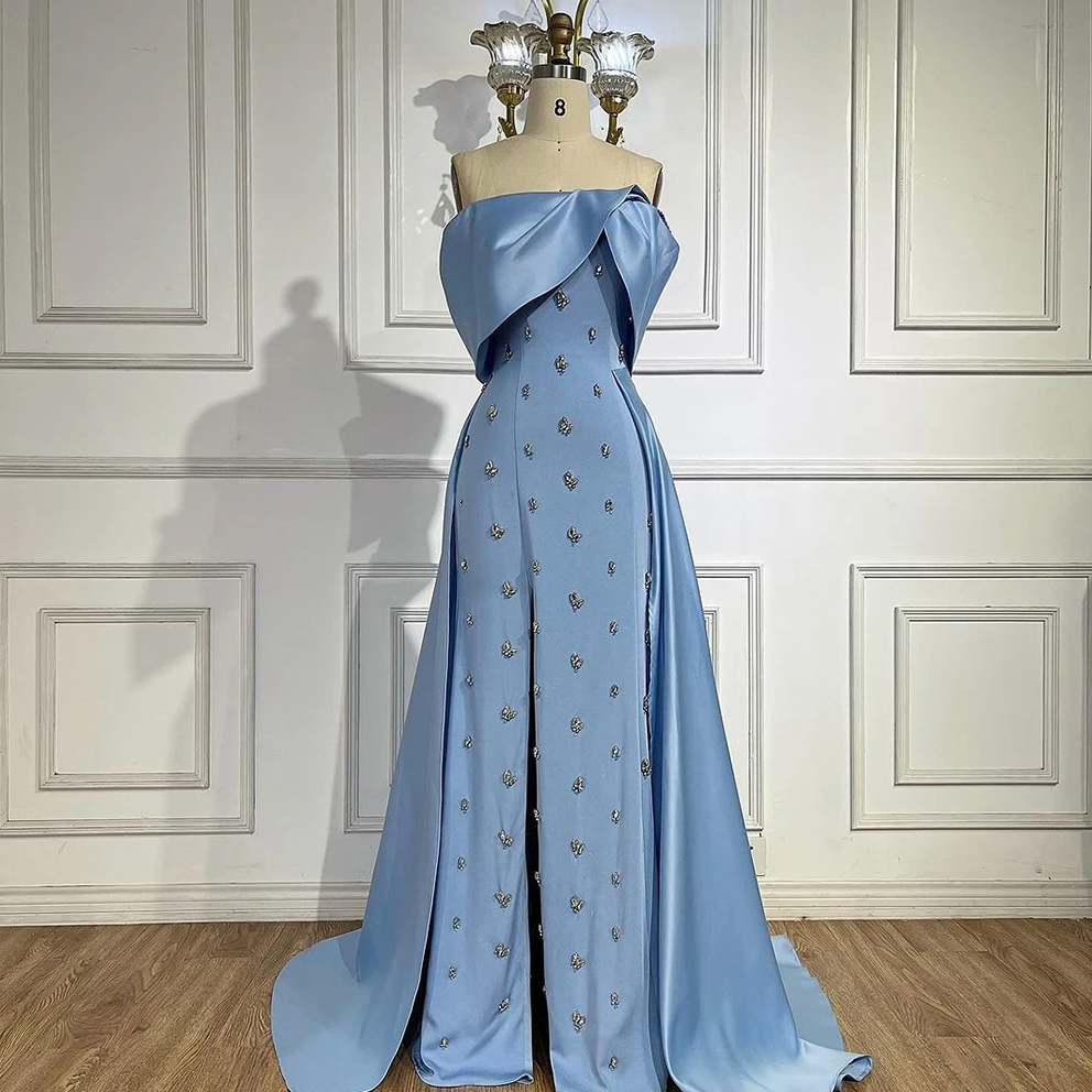 Woman Wearing The Old Money Collection Couture Mulholland Gown