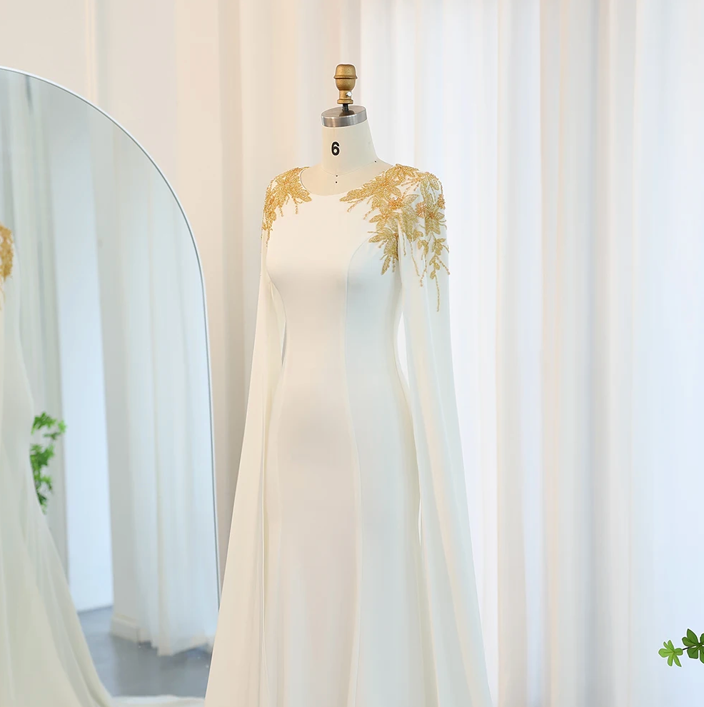 The Old Money Collection Willoughby Gown, an evening gown with gold embellishments