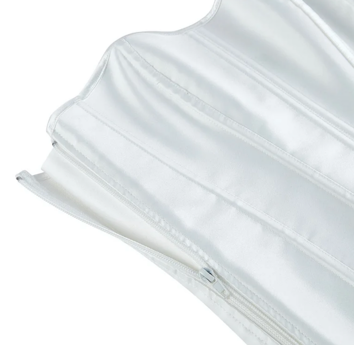White satin Soli overbust corset featuring structured boning and a sleek front zipper closure.